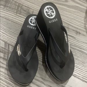 Guess wedge flip flops